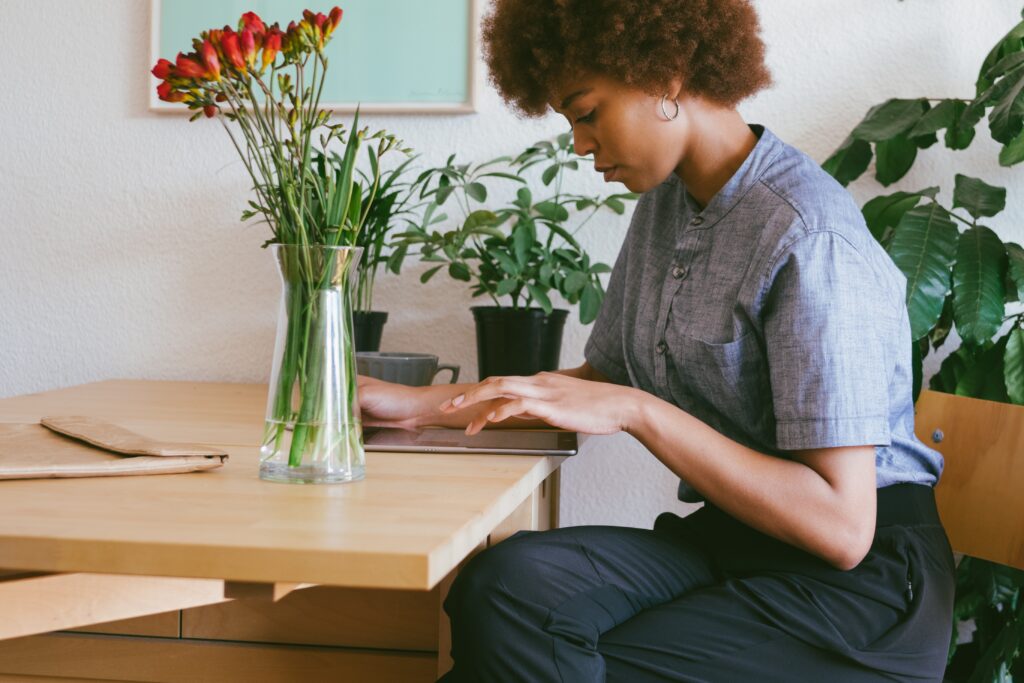 Woman Working on a tablet work from home